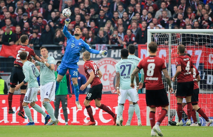 中超：北京国安客场2-1击败梅州客家（中超：北京国安客场2-1力克梅州客家）